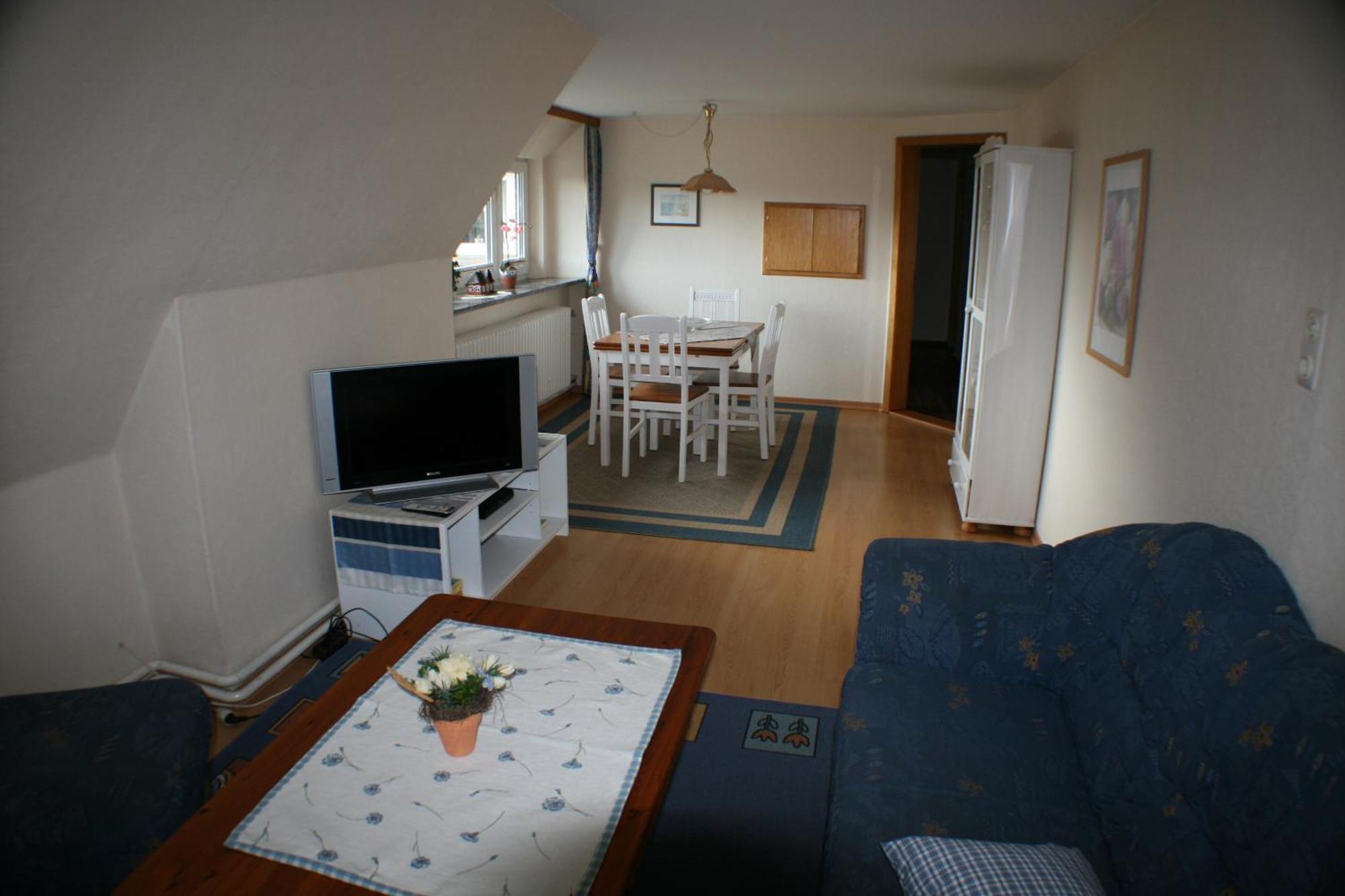 Ferienwohnungen Im Hotel Garni Zur Post Utersum Rom bilde