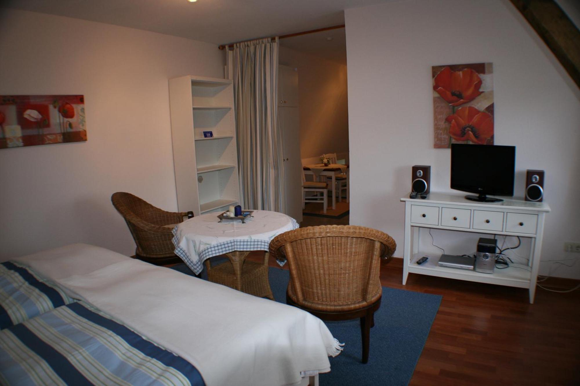 Ferienwohnungen Im Hotel Garni Zur Post Utersum Rom bilde