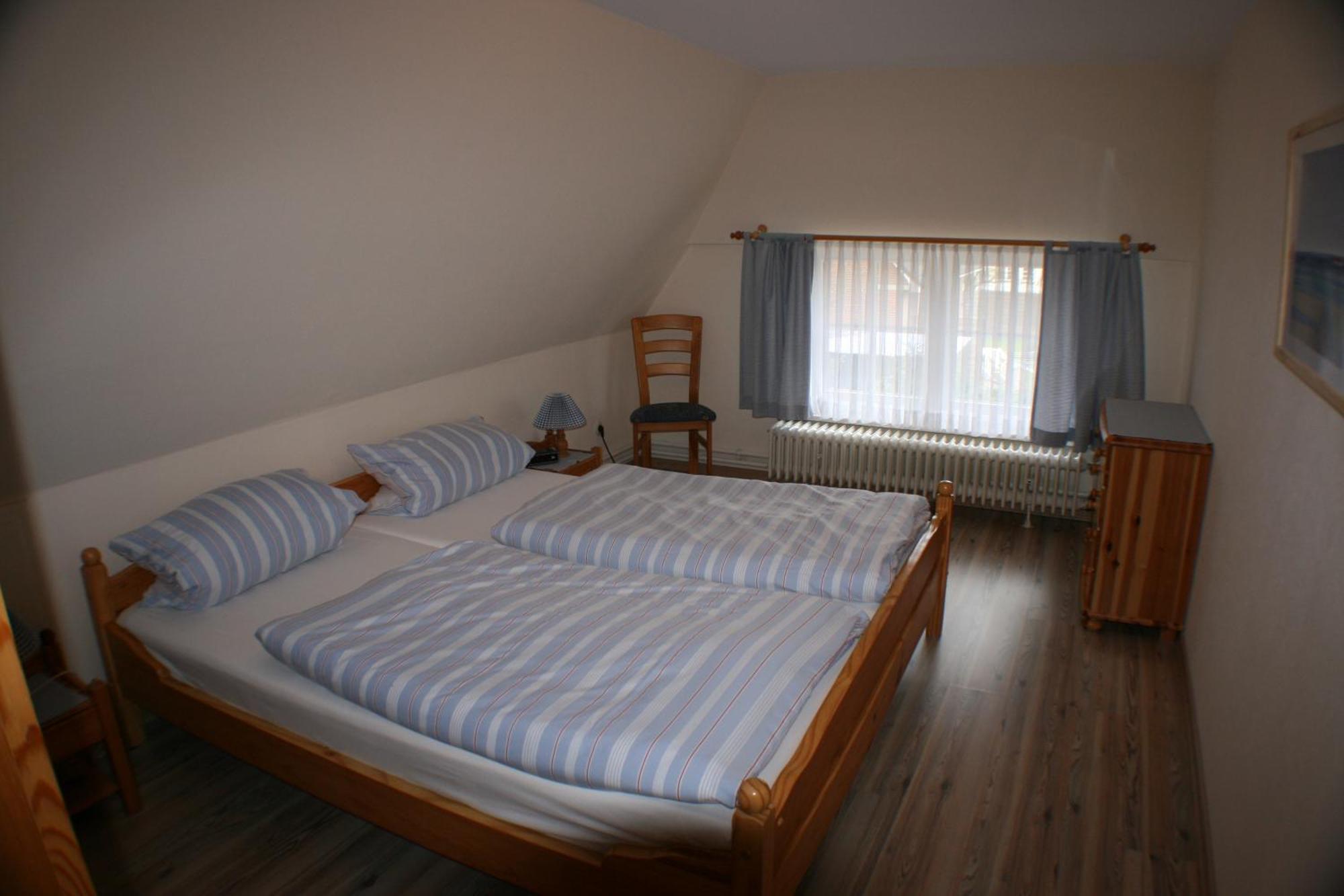 Ferienwohnungen Im Hotel Garni Zur Post Utersum Rom bilde