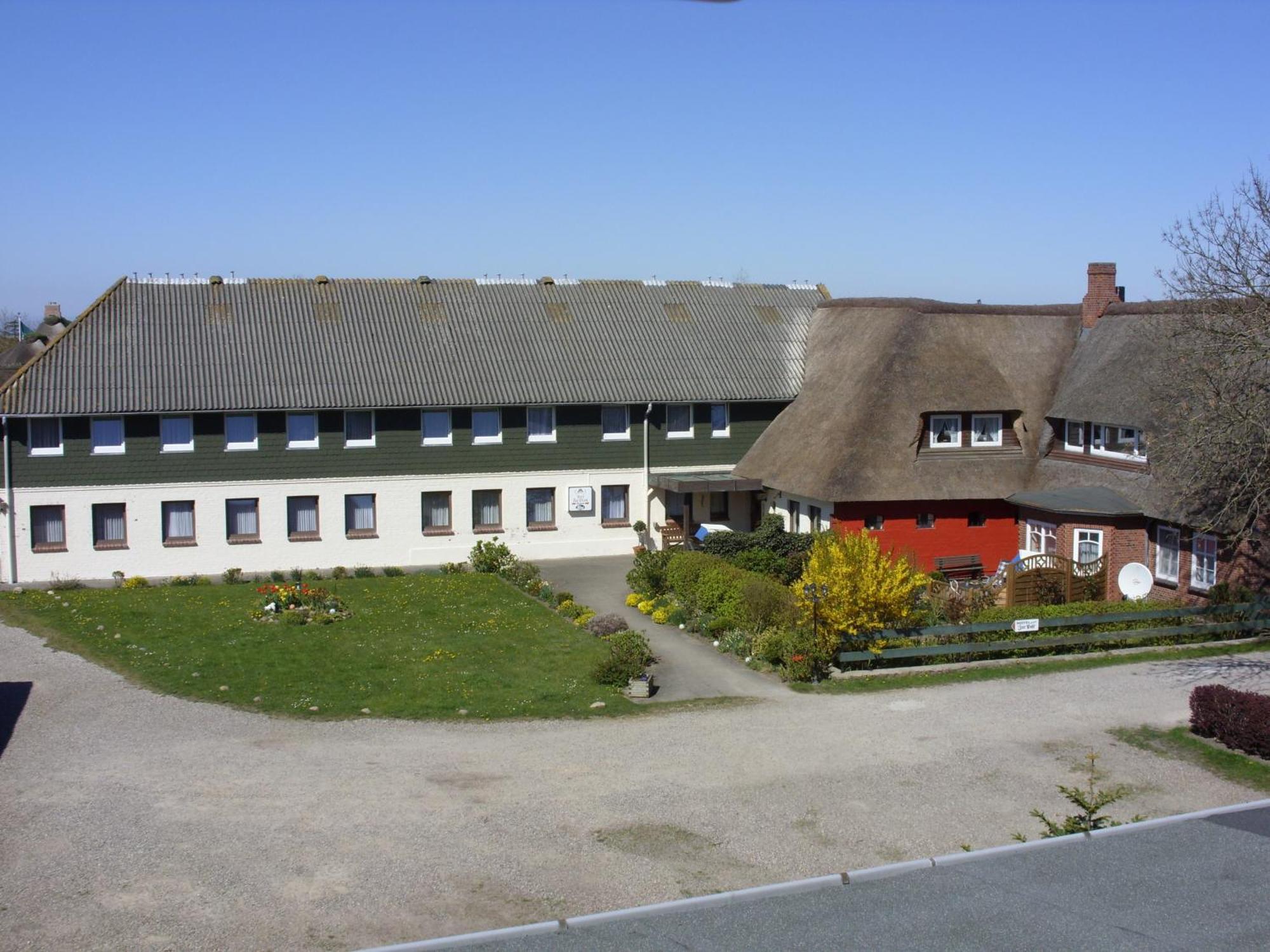 Ferienwohnungen Im Hotel Garni Zur Post Utersum Rom bilde